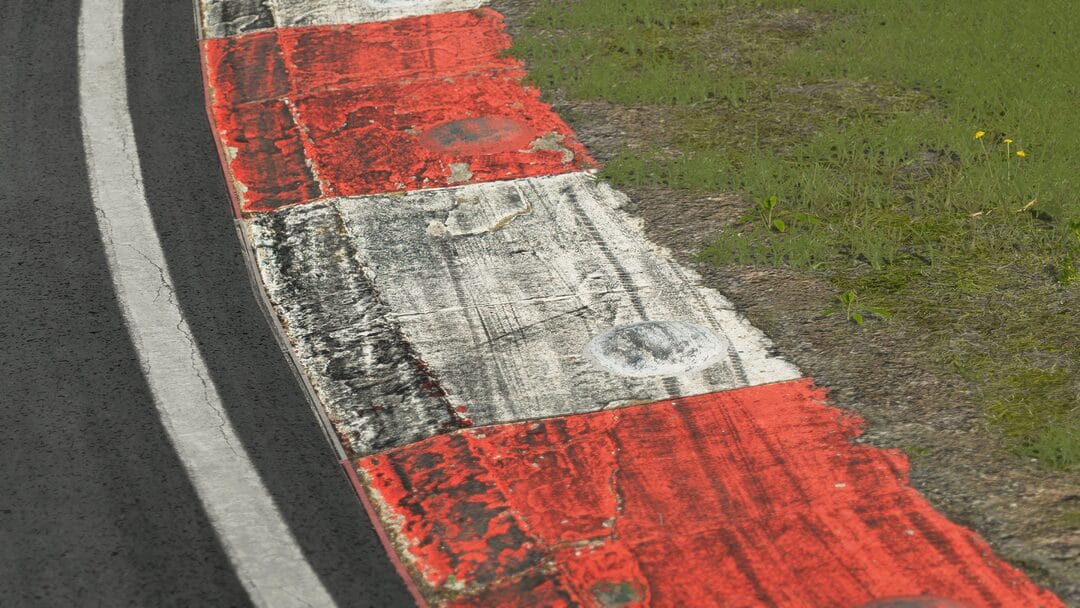 Close-up of a Brands Hatch racetrack curb in Assetto Corsa EVO, displaying the intricate textures and visual details