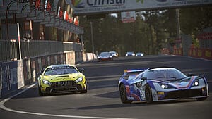 Daylight Racing Action: Cars Speeding on Zolder Circuit in Assetto Corsa Competizione