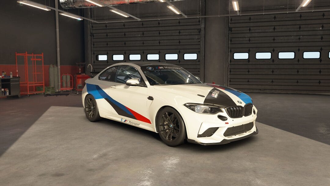 BMW M2 CS Racing F87 2020 race car showcased in a trackside garage setting in acevo simracing